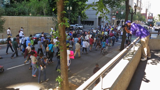 Image of protesters marching through Portland